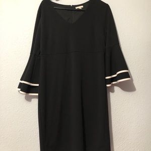 black dress with bell sleeves